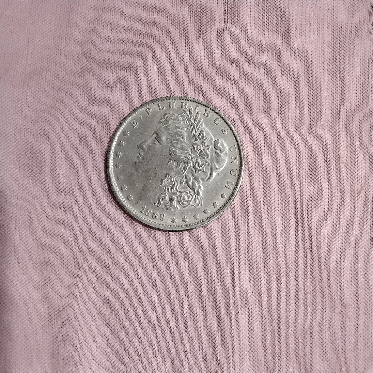 جعل یا اصل بودن سکه یک دلاری آمریکا