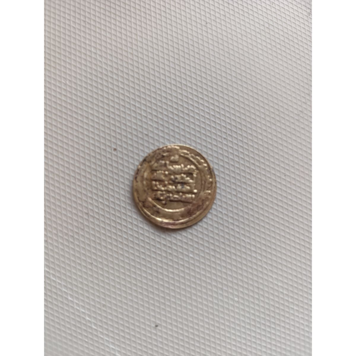 پرسش در مورد اصالت سکه