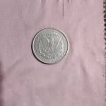 جعل یا اصل بودن سکه یک دلاری آمریکا